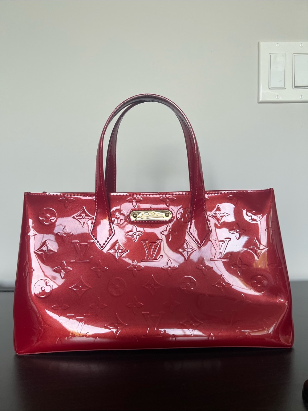 LV deep red patent leather logo bag